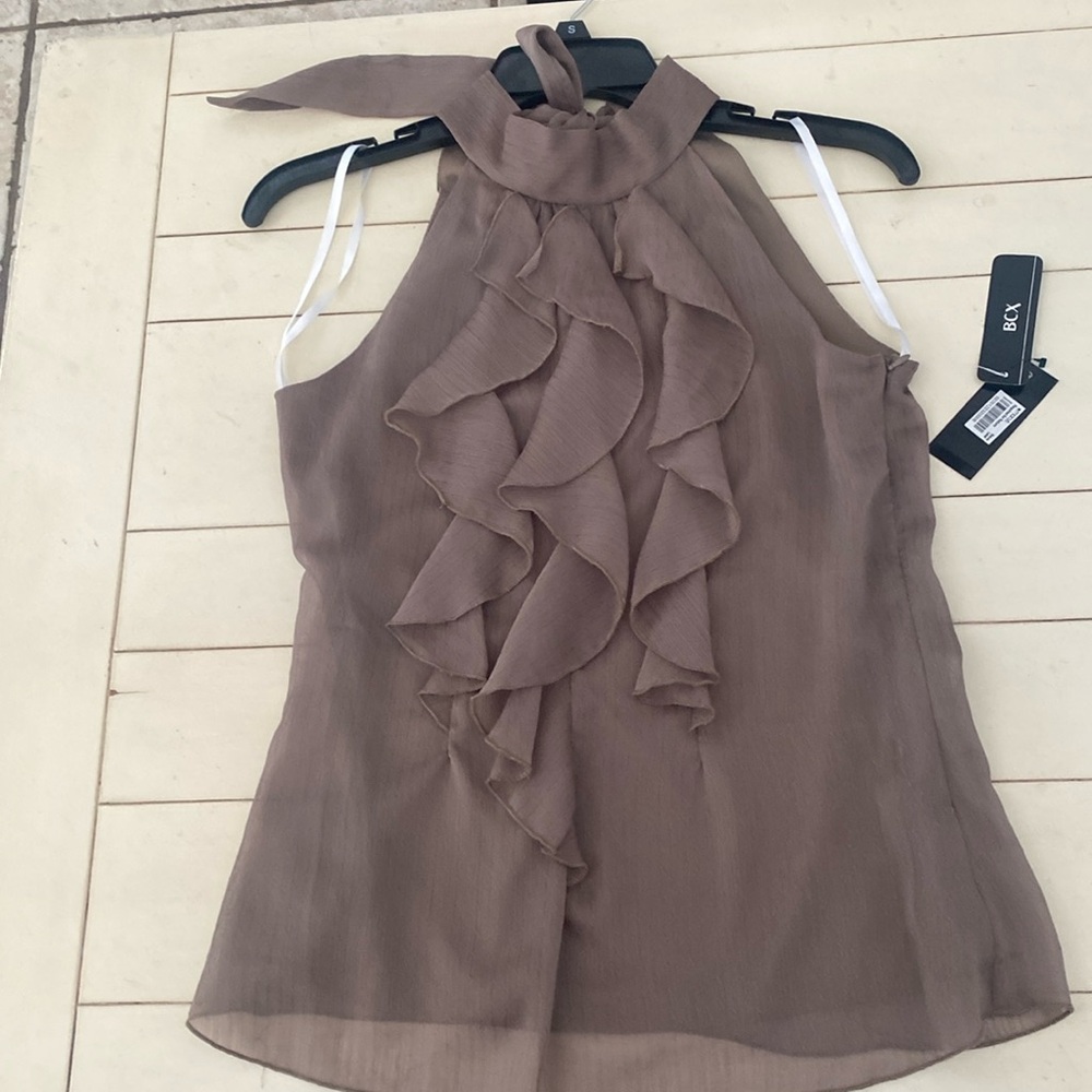 Woman’s BCX 100% polyester blouse. Size S. NWT. Original price was $39.00